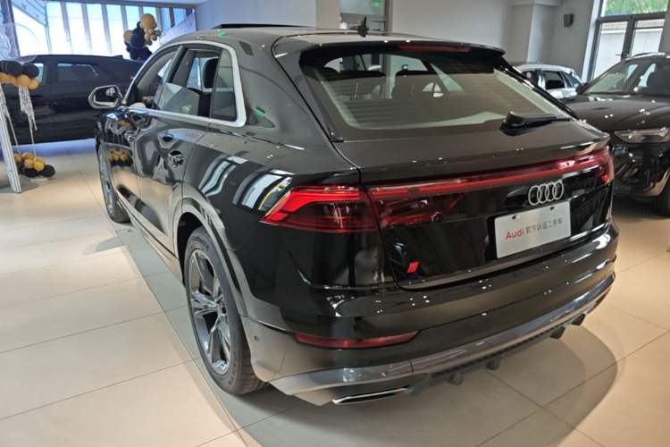 Used Audi Q8 2024 55 TFSI Luxury Dynamic Model Rear Left 45 Deg