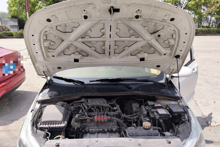Used Baojun 310 2016 1.2L manual Comfort trim level Engine Bay