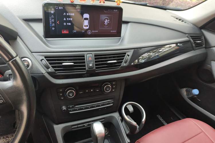 Used BMW X1 2010 xDrive25i Audio And AC Panel