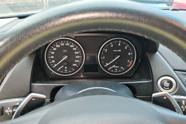 Used BMW X1 2010 xDrive28i Odometer Close Up