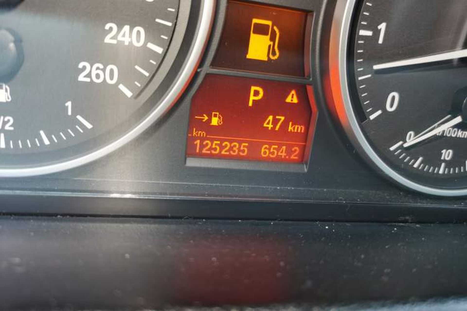 Used BMW X1 2012 xDrive20i Odometer Close Up