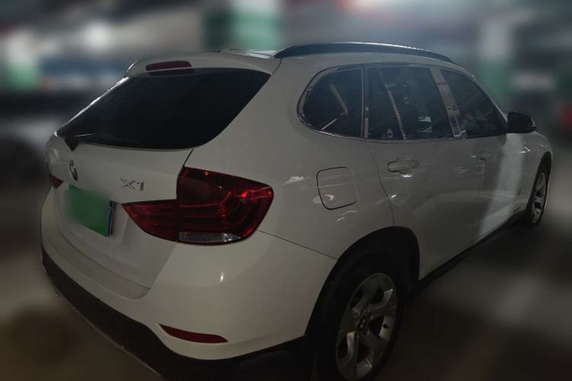 Used BMW X1 2012 sDrive18i Luxury Edition Rear Right 45 Deg