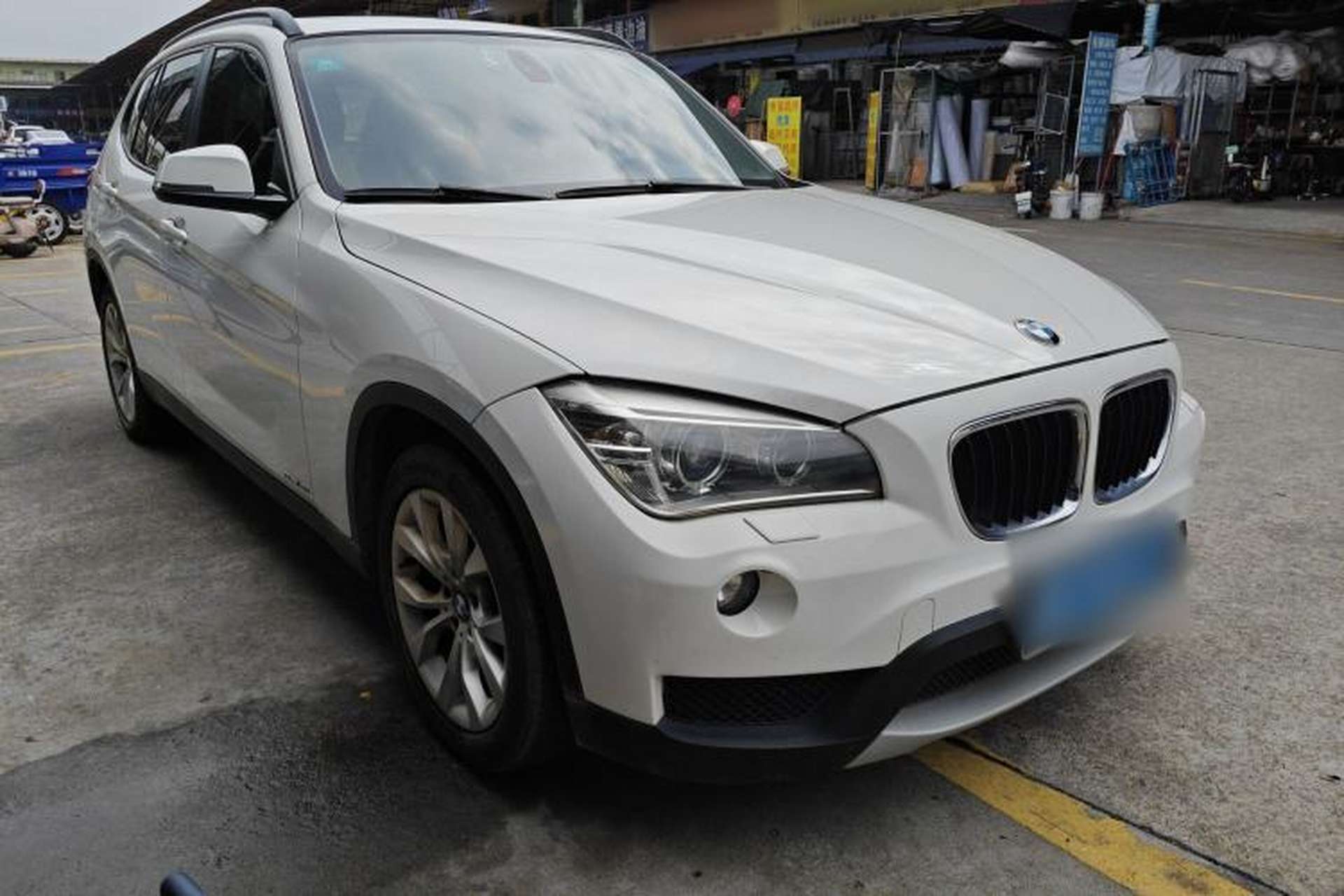 Used BMW X1 2013 sDrive18i Leading Model Front Right 45 Deg