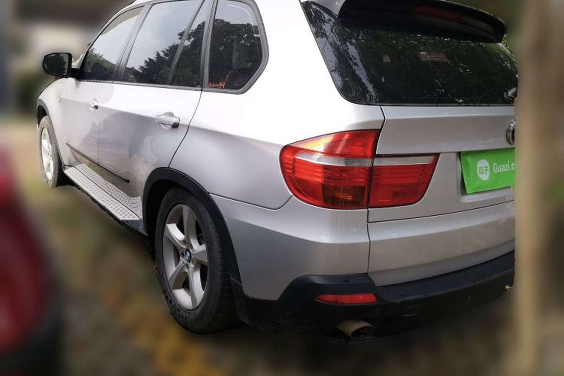 Used BMW X5 2010 xDrive30i Luxury Edition 10th Anniversary Model Rear Left 45 Deg