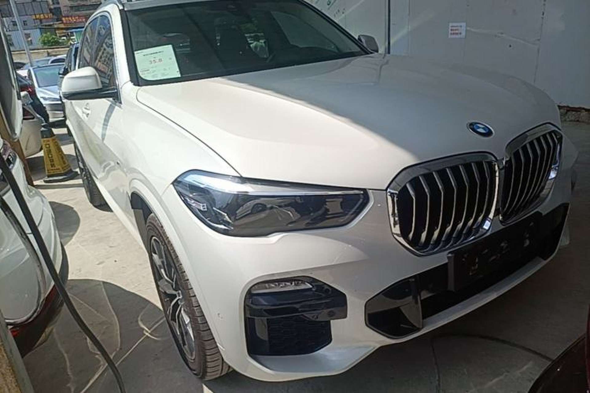 Used BMW X5 New Energy 2021 xDrive45e M Sport Package Front Right 45 Deg