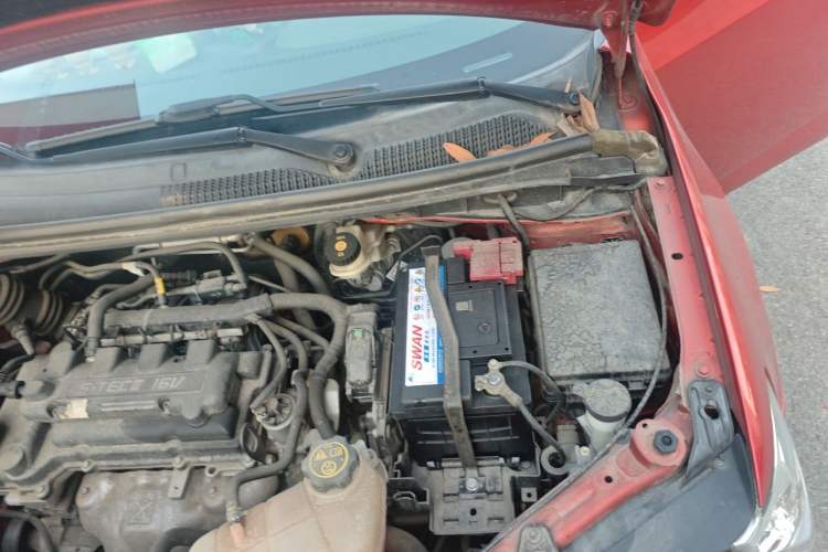 Used Chevrolet Aveo Sonic 2011 Sedan 1.4L Manual Transmission SE Engine Bay Left