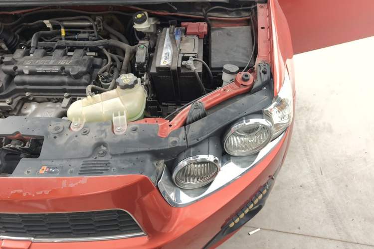 Used Chevrolet Aveo Sonic 2011 Sedan 1.4L Manual Transmission SE Engine Bay Left