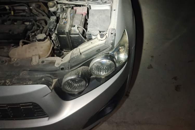 Used Chevrolet Aveo Sonic 2011 Sedan 1.4L Manual Transmission SE Engine Bay Left