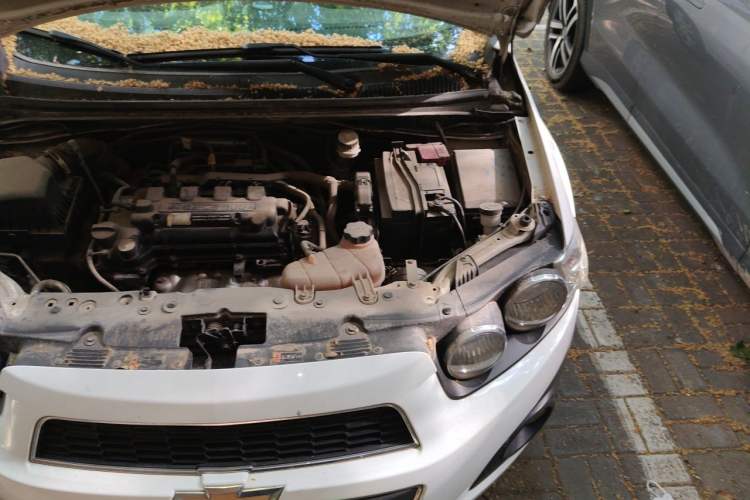 Used Chevrolet Aveo Sonic 2011 Sedan 1.4L Manual Transmission SE Engine Bay Left