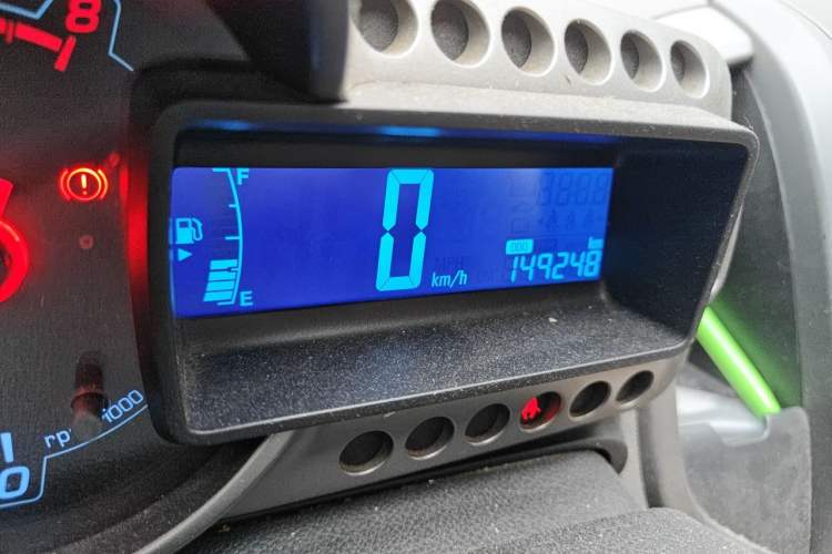 Used Chevrolet Aveo Sonic 2011 Sedan 1.4L MT SL Odometer Close Up