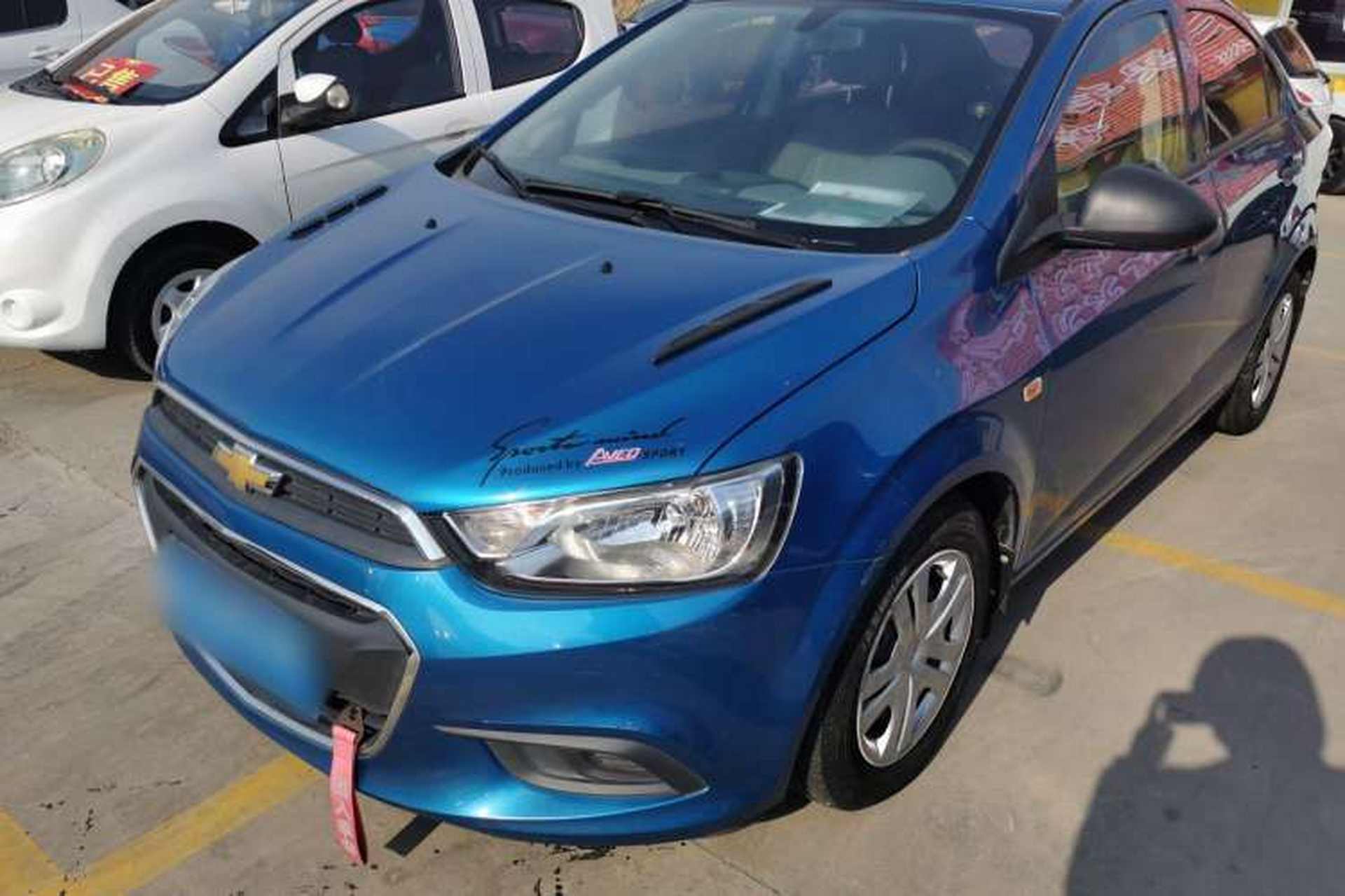 Used Chevrolet Aveo Sonic 2014 Sedan 1.4SL MT Comfort Edition Front Left 45 Deg