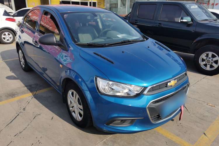 Used Chevrolet Aveo Sonic 2014 Sedan 1.4SL MT Comfort Edition Front Right 45 Deg