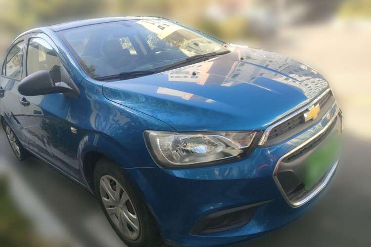 Used Chevrolet Aveo Sonic 2014 Sedan 1.4SL MT Comfort Edition Front Right 45 Deg