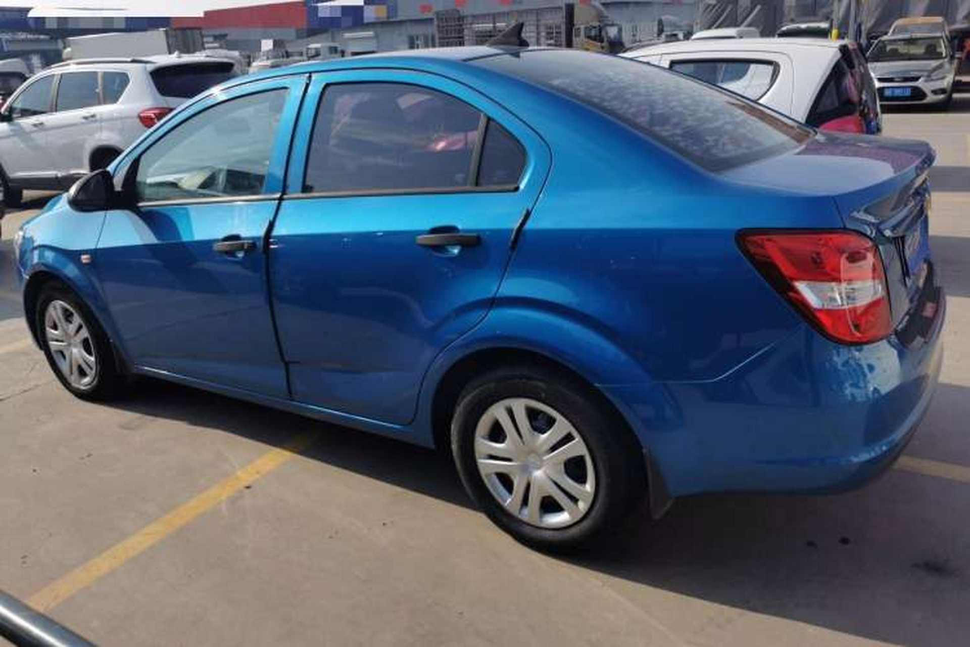 Used Chevrolet Aveo Sonic 2014 Sedan 1.4SL MT Comfort Edition Left Side