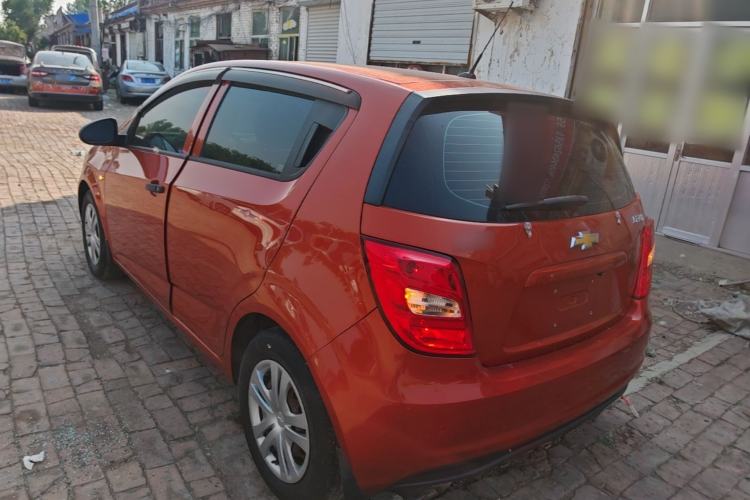 Used Chevrolet Aveo Sonic 2014 Hatchback 1.4SL MT Comfort Edition Rear Left 45 Deg