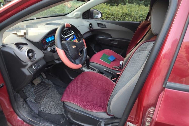 Used Chevrolet Aveo Sonic 2014 Sedan 1.4SL AT Stylish Sunroof Edition Left Front Seat