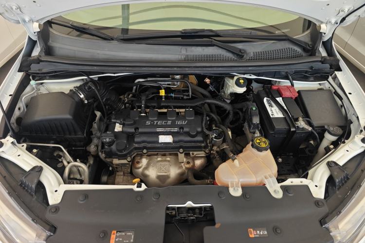 Used Chevrolet Aveo Sonic 2014 Sedan 1.4SL AT Stylish Sunroof Edition Engine Bay
