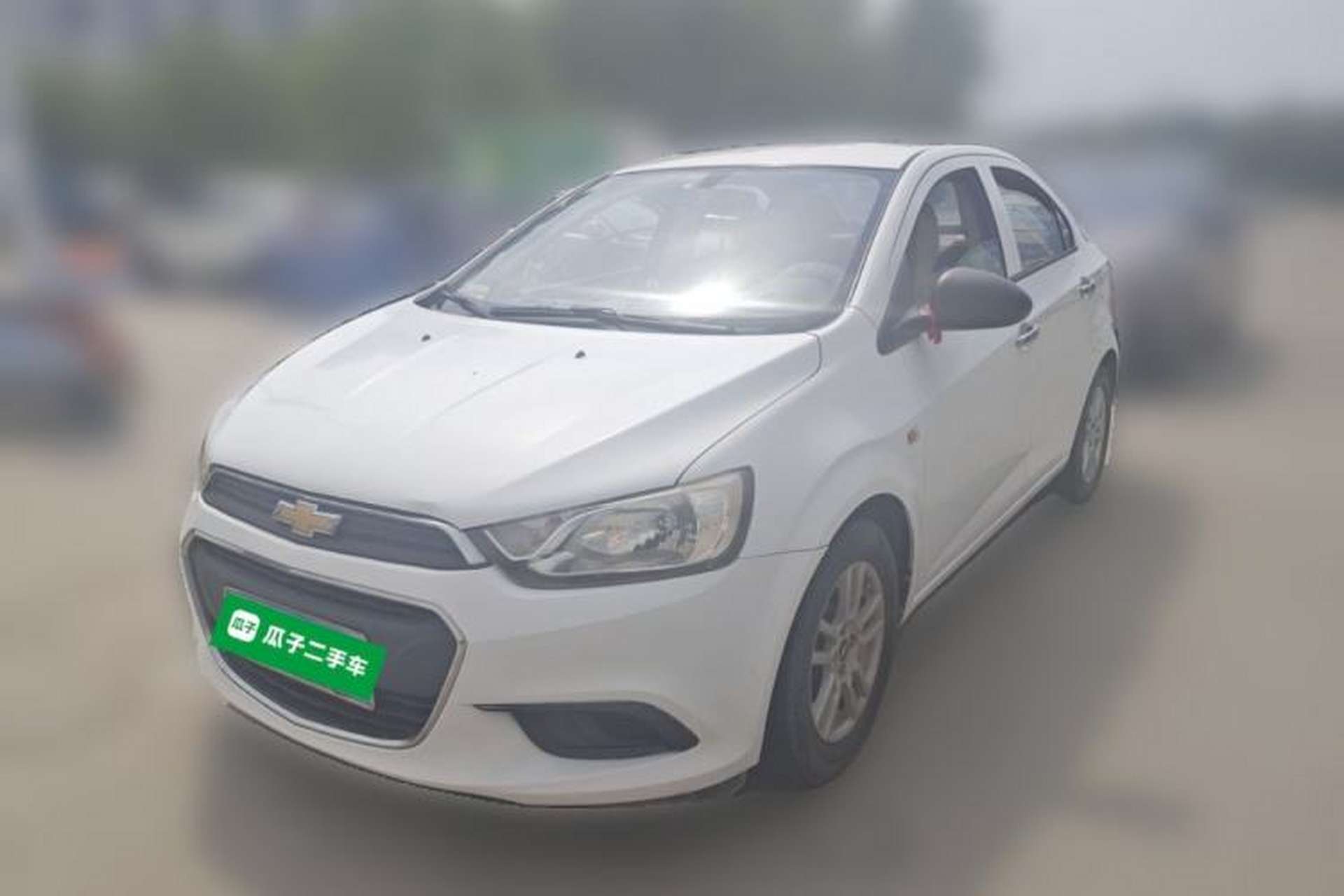 Used Chevrolet Aveo Sonic 2014 Sedan 1.4 SL MT Comfort Edition Front Left 45 Deg