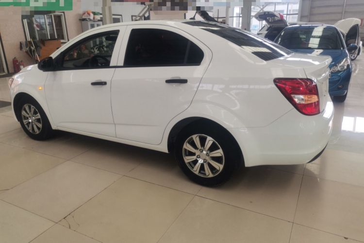Used Chevrolet Aveo Sonic 2014 Sedan 1.4SL MT Comfort Edition Left Side