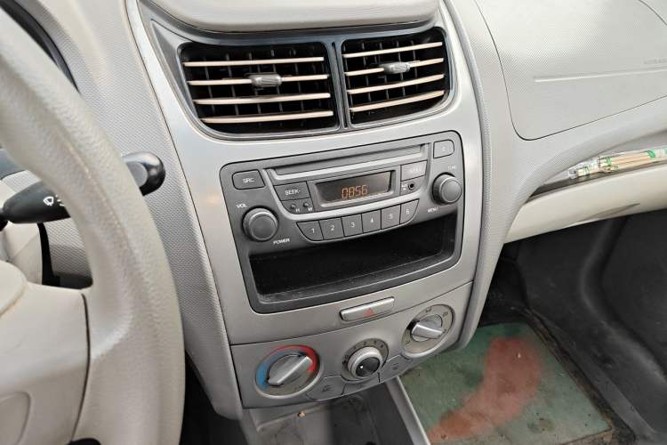 Used Chevrolet Sail 2011 Sedan 1.4L Manual Happiness Edition Audio And AC Panel