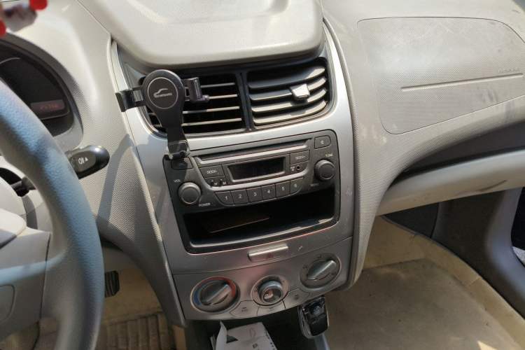 Used Chevrolet Sail 2011 Sedan 1.4L Manual Happiness Edition Audio And AC Panel