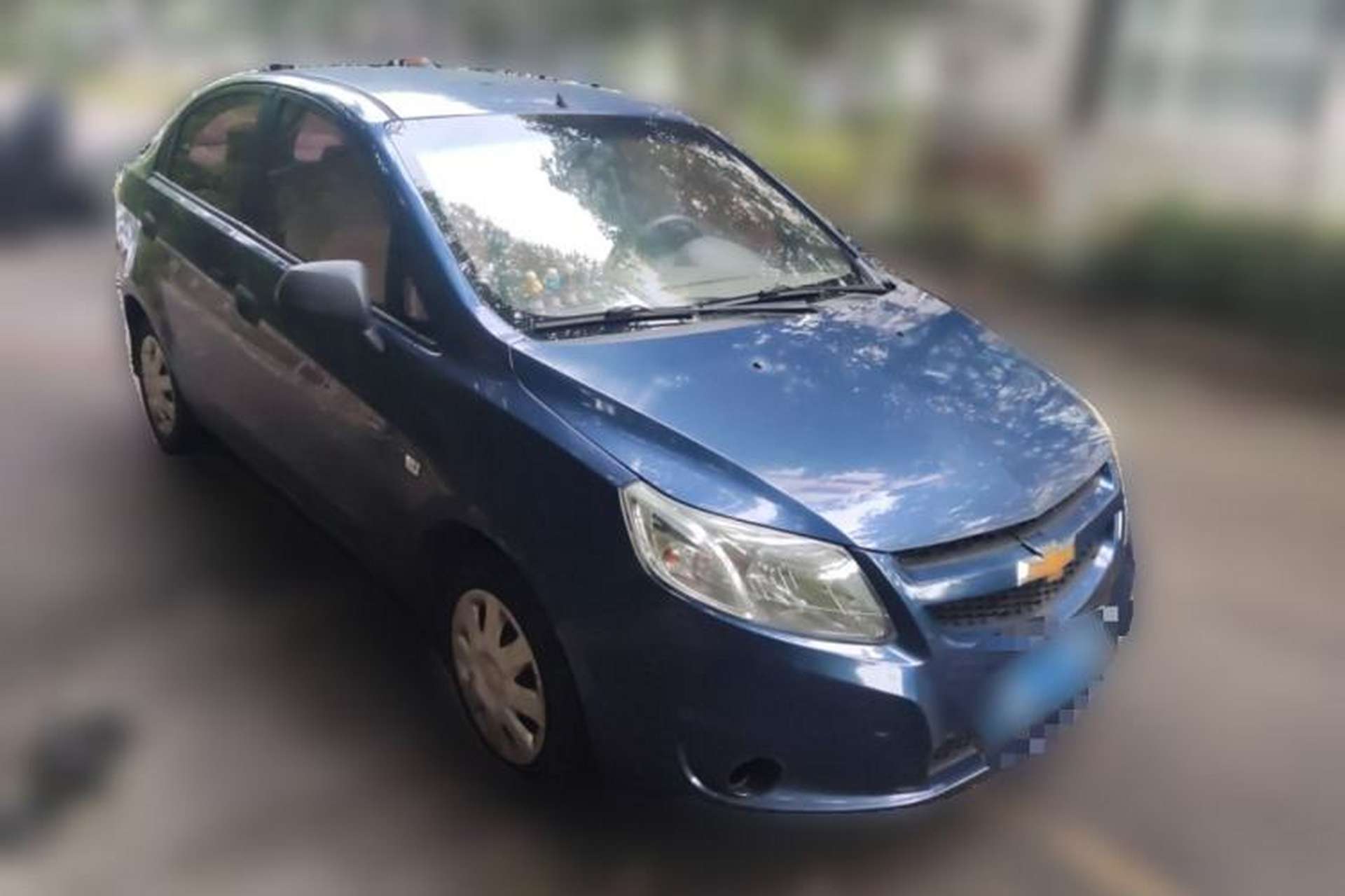Used Chevrolet Sail 2011 Sedan 1.4L Manual Happiness Edition Front Right 45 Deg