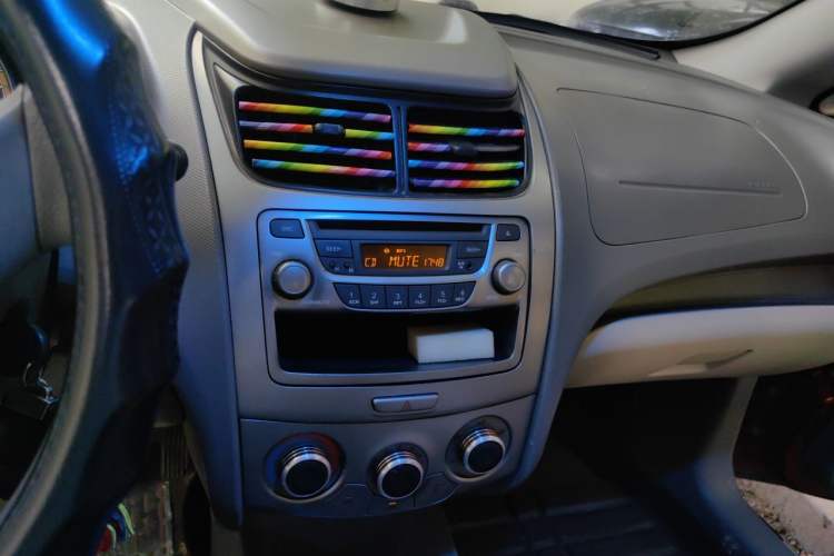 Used Chevrolet Sail 2011 Sedan 1.4L Manual Happiness Edition Audio And AC Panel