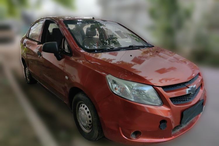 Used Chevrolet Sail 2011 Sedan 1.4L Manual Happiness Edition Front Right 45 Deg