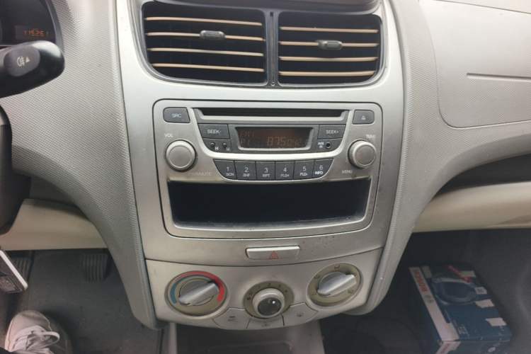 Used Chevrolet Sail 2011 Sedan 1.4L Manual Happiness Edition Audio And AC Panel