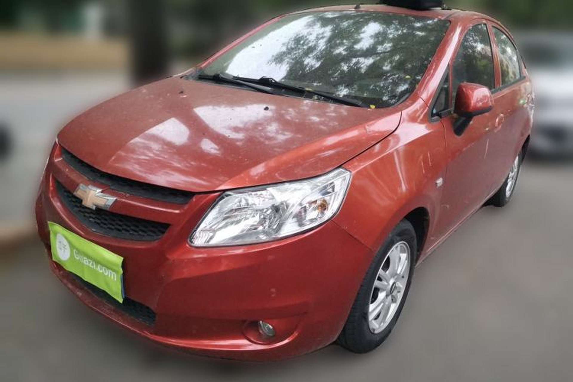 Used Chevrolet Sail 2011 Sedan 1.4L AMT Happiness Edition Front Left 45 Deg
