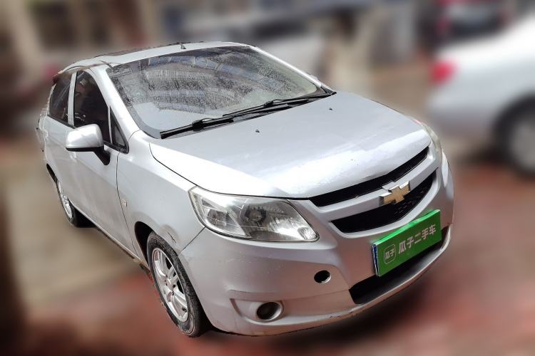 Used Chevrolet Sail 2011 Sedan 1.4L AMT Happiness Edition Front Right 45 Deg