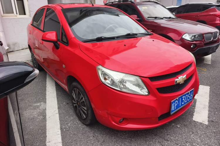 Used Chevrolet Sail 2011 Sedan 1.4L Manual Happiness Edition Front Right 45 Deg