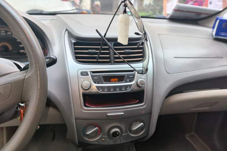 Used Chevrolet Sail 2011 Sedan 1.4L Manual Happiness Edition Audio And AC Panel