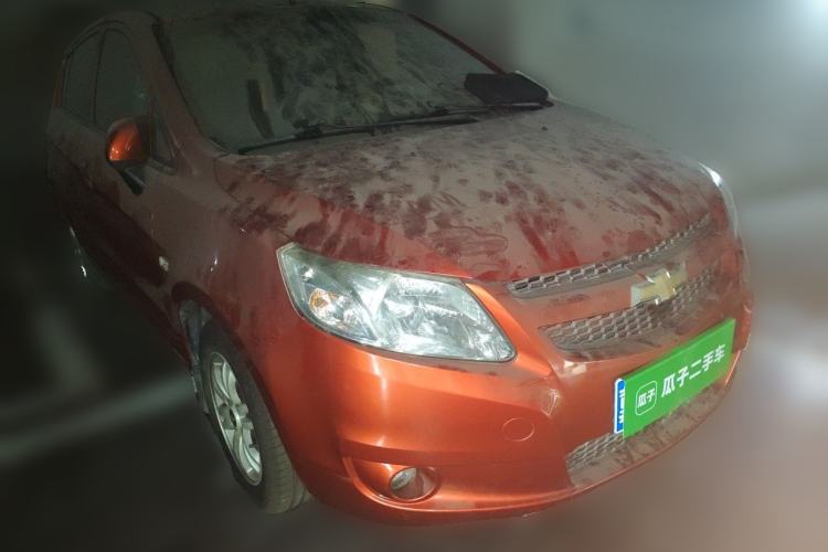 Used Chevrolet Sail 2011 Hatchback 1.4L AMT Happiness Edition Front Right 45 Deg