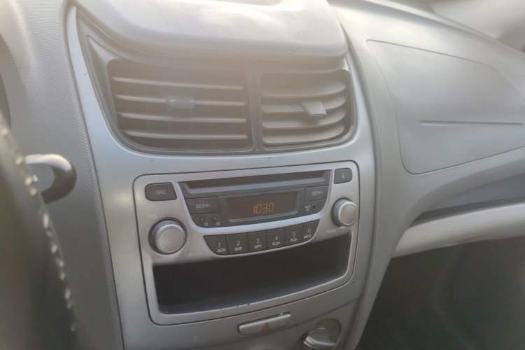 Used Chevrolet Sail 2011 Sedan 1.4L Manual Happiness Edition Audio And AC Panel