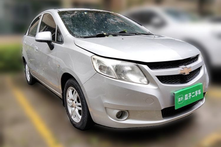 Used Chevrolet Sail 2011 Sedan 1.4L Manual Happiness Edition Front Right 45 Deg