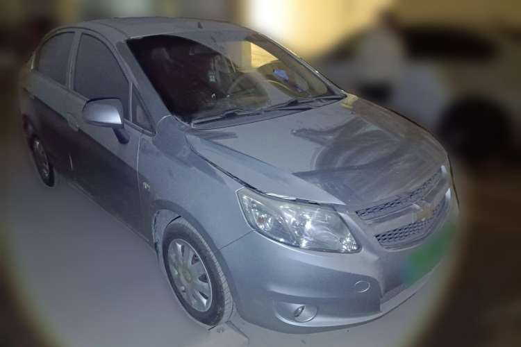 Used Chevrolet Sail 2011 Sedan 1.4L AMT Happiness Edition Front Right 45 Deg