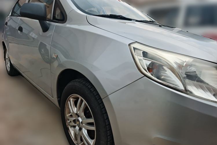 Used Chevrolet Sail 2011 Sedan 1.4L Manual Happiness Edition Front Right 45 Deg
