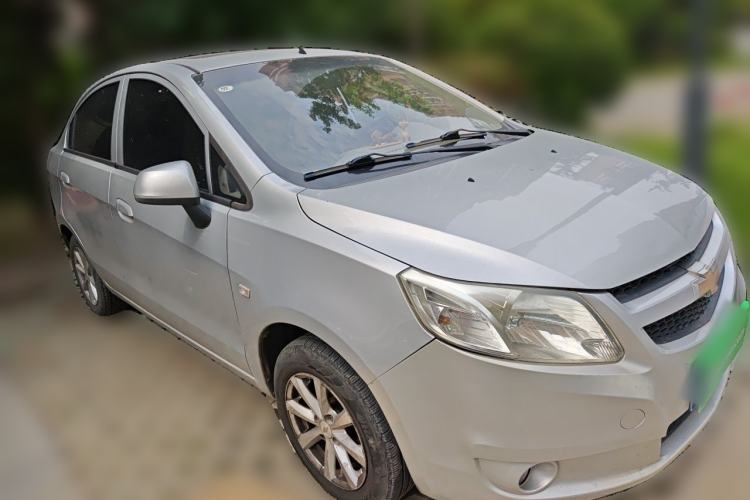Used Chevrolet Sail 2011 Sedan 1.4L Manual Happiness Edition Front Right 45 Deg