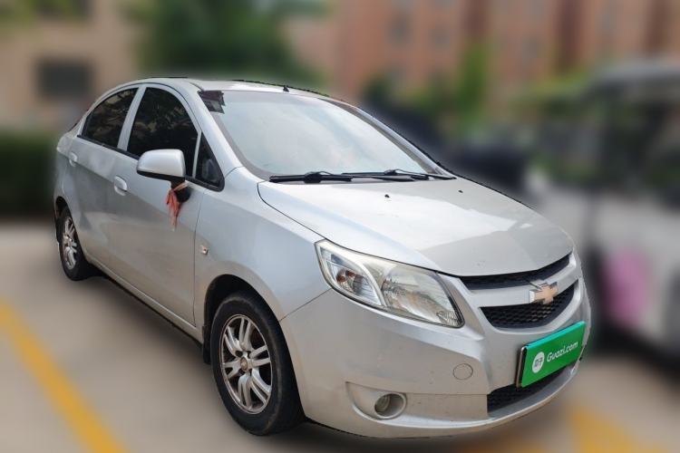 Used Chevrolet Sail 2011 Sedan 1.4L Manual Happiness Edition Front Right 45 Deg