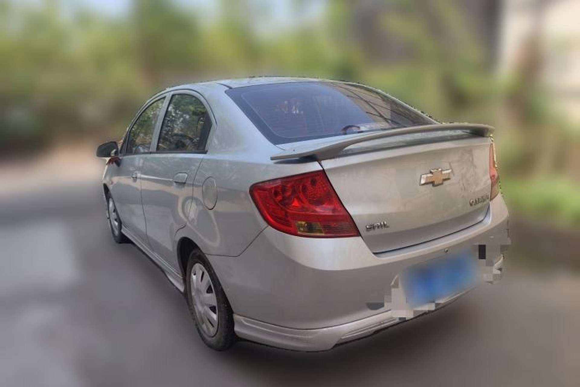 Used Chevrolet Sail 2011 Sedan 1.4L Manual Happiness Edition Rear Left 45 Deg
