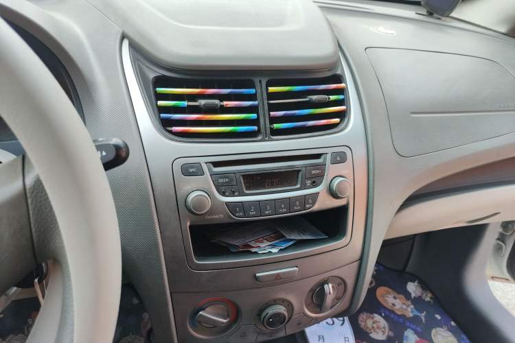 Used Chevrolet Sail 2011 Sedan 1.4L AMT Happiness Edition Audio And AC Panel