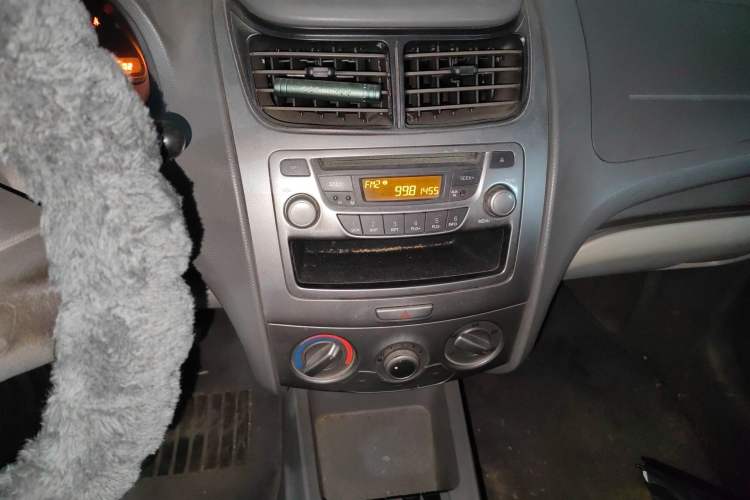 Used Chevrolet Sail 2011 Sedan 1.4L Manual Happiness Edition Audio And AC Panel
