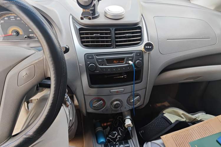 Used Chevrolet Sail 2011 Sedan 1.4L Manual Happiness Edition Audio And AC Panel