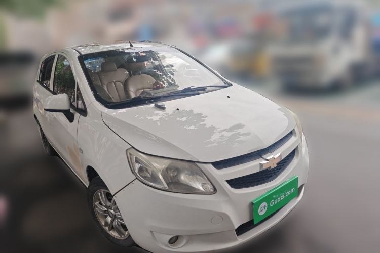 Used Chevrolet Sail 2011 Hatchback 1.4L AMT Happiness Edition Front Right 45 Deg