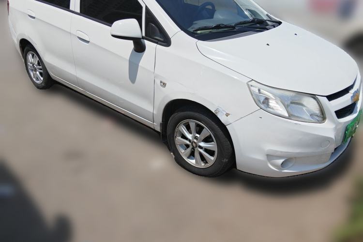 Used Chevrolet Sail 2011 Sedan 1.4L AMT Happiness Edition Front Right 45 Deg