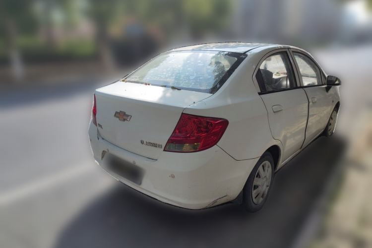 Used Chevrolet Sail 2011 Sedan 1.4L AMT Happiness Edition Rear Right 45 Deg
