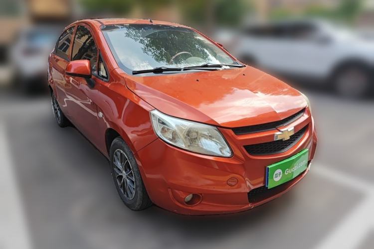 Used Chevrolet Sail 2011 Sedan 1.4L AMT Happiness Edition Front Right 45 Deg