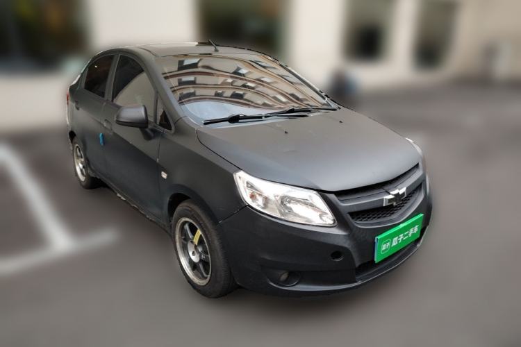 Used Chevrolet Sail 2013 Sedan 1.4L Manual Happiness Edition II Front Right 45 Deg