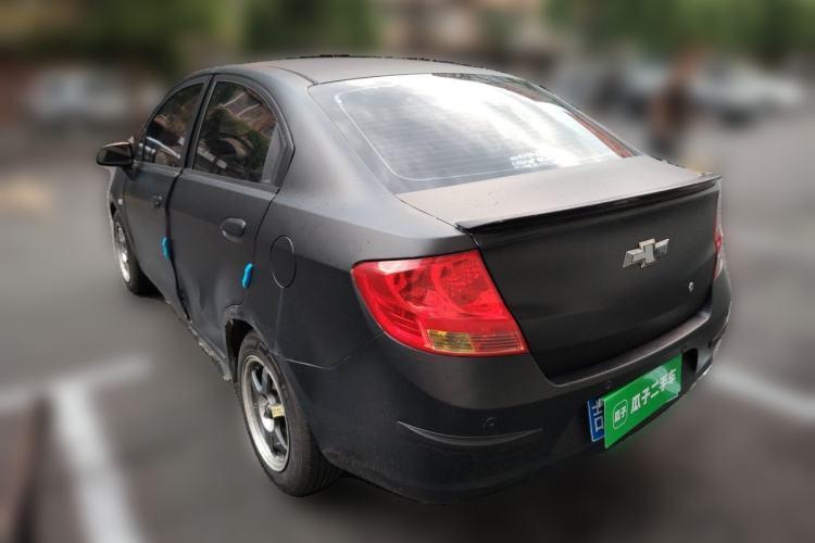 Used Chevrolet Sail 2013 Sedan 1.4L Manual Happiness Edition II Rear Left 45 Deg